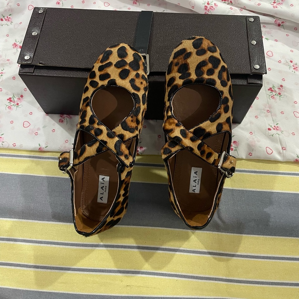 Alaia Leopard-Print Mary Jane Flats in Black and Brown